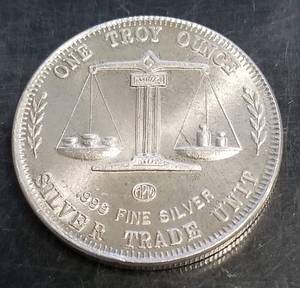 1 TROY OZ .999 FINE SILVER VINTAGE TRADE UNIT APM SHIP ROUND
