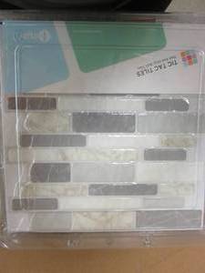 lot 539 image: Tic Tac Tiles Polito Gray 10 in. W x 10 in. H Peel and Stick Self-Adhesive Decorative Mosaic Wall Tile Backsplash (5-Tiles) - 3 CASES TOTAL