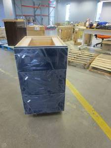 lot 540 image: Home Decorators Collection Newport Blue Painted Plywood Shaker Stock Assembled Drawer Base Kitchen Cabinet 3-Drawer 18 in. x 34.50 in. x 24 in. (DRAWERS WILL NOT CLOSE FULLY ON ONE SIDE, SEE PHOTOS)