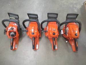 lot 694 image: (4) ECHO CS-490 50.2 cc professional grade 2-stroke engines Without Bar, Missing Parts, All 4 do not Run.  For PartsRestore.