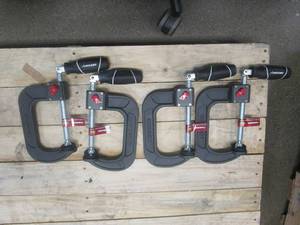 lot 623 image: Husky 4 in. Quick Adjustable C-Clamp with Rubber Handle - 4 PACK