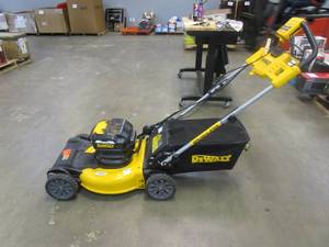 lot 661 image: DEWALT 20V MAX 21.5 in. Battery Powered Walk Behind Self Propelled Lawn Mower with (2) 10Ah Batteries & Charger (NICE CONDITION)