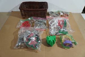 lot 86 image: Assorted Holiday Cookie Cutters in Basket