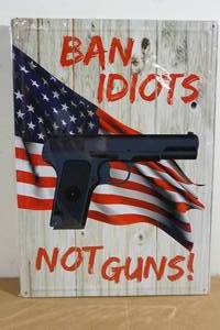 lot 93 image: Novelty Metal Sign - Ban Idiots Not Guns