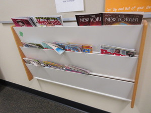 lot 453 image: WALL MOUNT MAGAZINE RACK
