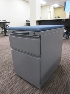 lot 292 image: HERMAN MILLER MOBILE PEDESTAL FILE UNITS WITH UPHOLSTERED TOPS