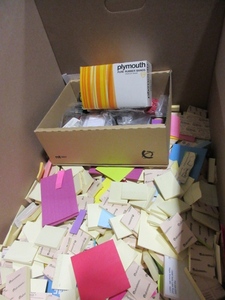 lot 365 image: A BOX WITH POST IT NOTES AND RUBBER BANDS