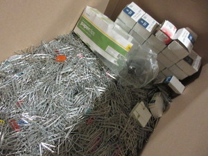 lot 366 image: A BOX WITH MANY, MANY PAPER CLIPS