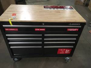 lot 10 image: Husky 46 in. W x 24.5 in. D Standard Duty 9-Drawer Mobile Workbench Tool Chest with Solid Wood Top in Gloss Black customer return review pictures