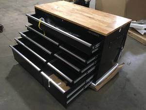 lot 12 image: Husky 52 in. W x 25 in. D Standard Duty 9-Drawer Mobile Workbench Tool Chest with Solid Wood Top in Gloss Black customer return review pictures