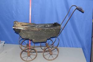 lot 29 image: vintage doll buggy