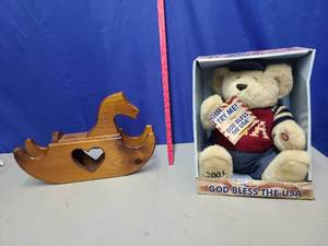 lot 53 image: Wooden rocking horse and God bless the USA bear