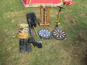 Sporting equipment lot includes bat...