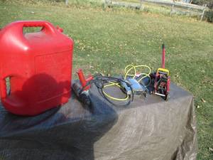 Hydraulic floor jack, 6 gal gas can...