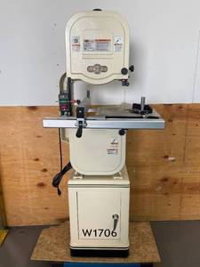 lot 46 image: SHOP FOX W1706- 14 Bandsaw w Cabinet Stand (MSRP $1750)