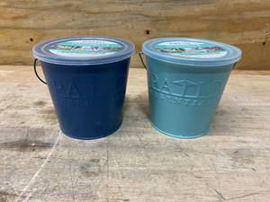 lot 57 image: PATIO ESSENTIALS Lot of 2- Citronella Candles in Decorative Buckets
