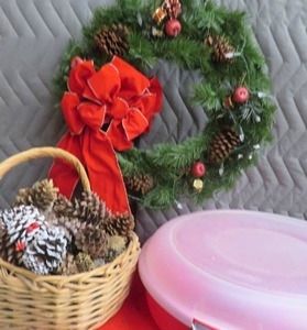 PRE LIT WREATH WITH STORAGE CONTAINER . BASKET OF PINECONES.