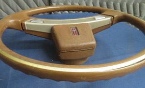 lot 79 image: VINTAGE OLDSMOBILE STEERING WHEEL
