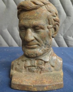 lot 99 image: CAST IRON ABE LINCOLN DOOR STOP