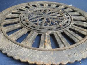 lot 102 image: 16 CAST IRON STOVE COVER