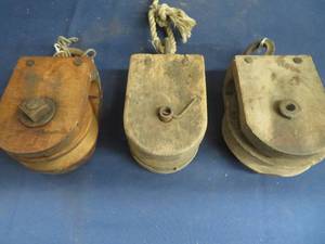 lot 106 image: ANTIQUE PULLYS