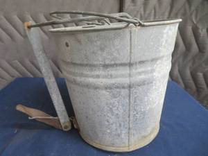 lot 107 image: GALVANIZED MOP BUCKET WITH WRINGER