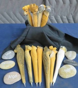 lot 121 image: 14 CARVED PEN HOLDERS AND STONES