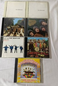 Lot of 7 Beatles Music CDs Help, Rubber Soul, Abby Road, Magical Mystery Tour, White Album, & Seargent Peppers Lonely Hearts Club Band