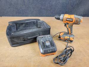 lot 705 image: RIDGID 18V Cordless Drill w Battery, Charger and Case - Tested and Works