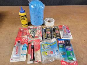 lot 899 image: J-B weld, Adhesives, Goop and More