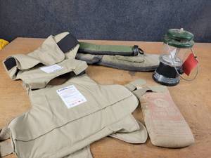 lot 895 image: Point Blank Body Armor, Long Gun Case, 25lb Shot and Coleman Lantern
