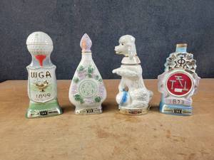 lot 1073 image: (4) Vintage Liquor Decanters - Jim Beam