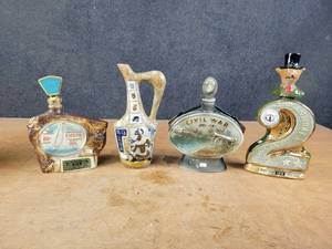 lot 1083 image: (4) Vintage Liquor Decanters - Jim Beam and Garnier - NO SHIPPING