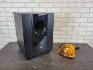 lot 1117 image: INSIGNIA Powered Home Theater Subwoofer, Model SW-51A and 12V Orange Strobe Light - NO SHIPPING