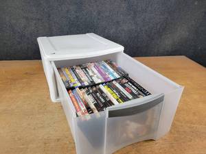 lot 1199 image: Large Lot of DVDs in Plastic Drawer