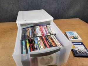 lot 1200 image: Large Lot of DVDs in Plastic Drawer