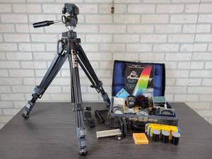 lot 1168 image: Lot of Vintage Photography Equipment - Slick Universal U-212 Tripod, Lens Filters, Light Meter, 35mm Film, and MORE