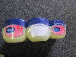 8 canisters of vaseline blue seal b...