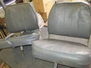 2 boat seats one has a rip ...