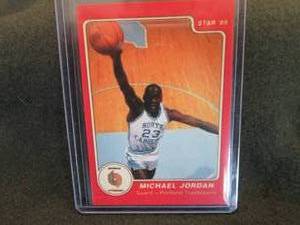 lot 64 image: Star 85 Michael Jordan Rookie Card...