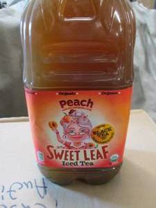 lot 405 image: Case of 8-64 oz Bottles Peach Sweet...