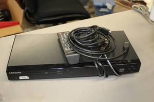 lot 783 image: Samsung DVD1080P-9 DVD Player with Remote Control and Cables