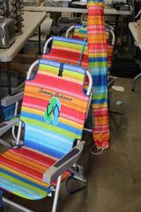 lot 768 image: (3) Tommy Bahama Chairs and (1) Beach Umbrella