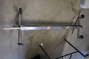 lot 832 image: Rolling Clothes Hanger Dislay
