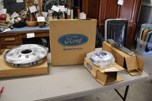 lot 869 image: Lot of (5) Ford Automotive Parts - Wheel Covers, Hub Caps, Seat Belt