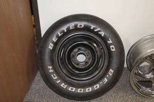 lot 879 image: BF Goodrich Belted TA 70 Tire with 5-lug Steel Rim