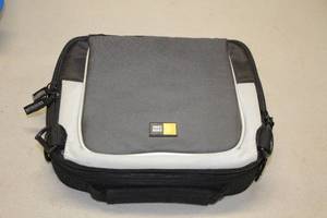 lot 599 image: Tom Tom GPS Navigator with Case-Logic Carry Case