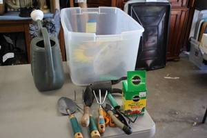 lot 593 image: Lot of (1 Bin) Garden Hand Tools, Hand Shovels, Hand Claws, Snips, Scissors, Bulb Planter, Miracle Gro Plany Food