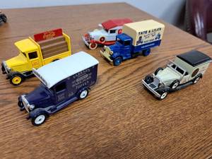 lot 242 image: Lot of (5) Toy Delivery Trucks
