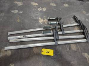 lot 74 image: (4) 32 Bar Clamps...